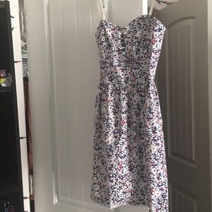 A knee length strapless dress